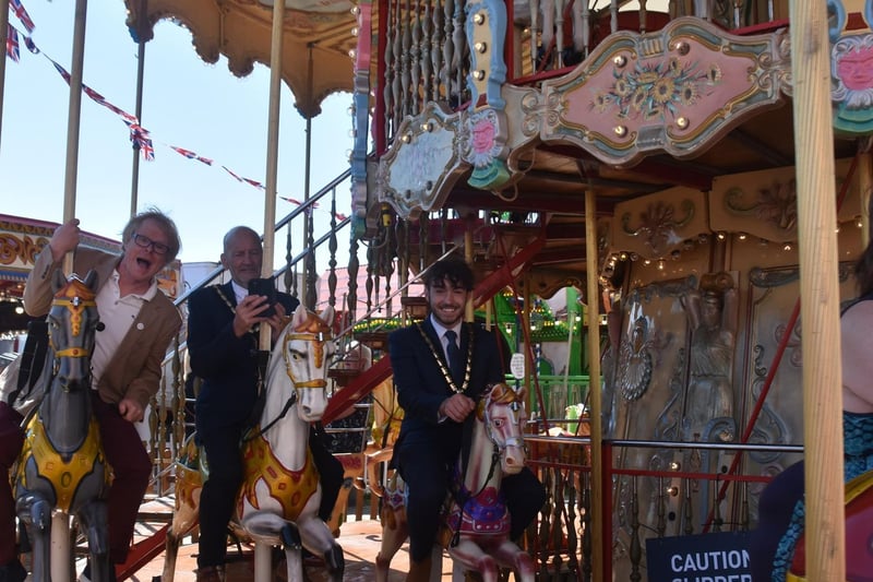 Honoured Citizen John Byford, Mayor Coun Trevor Burnham and Deputy Mayor Billy Brookes on the Carousel.