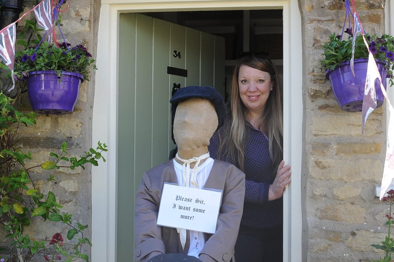 Scarecrow Festival at Werrington.   Lise Smith with Oliver at Church Street EMN-210529-155204009