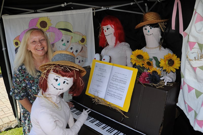 Scarecrow Festival at Werrington.  Anita Truman with the WI display EMN-210529-155237009