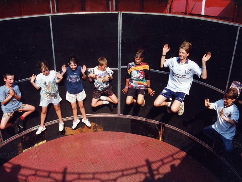 The gravity-defying wall of death spun faster and faster until riders were pinned to the sides