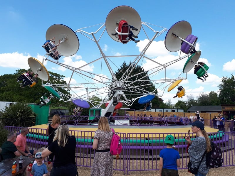 Part of the Thrill Zone - the spinning ride accelerates riders at an angle. Make sure you take off your flip-flops or they will fly