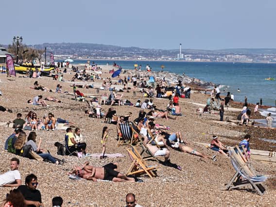 Beach goers enjoying the sun today. Picture by Eddie Mitchell