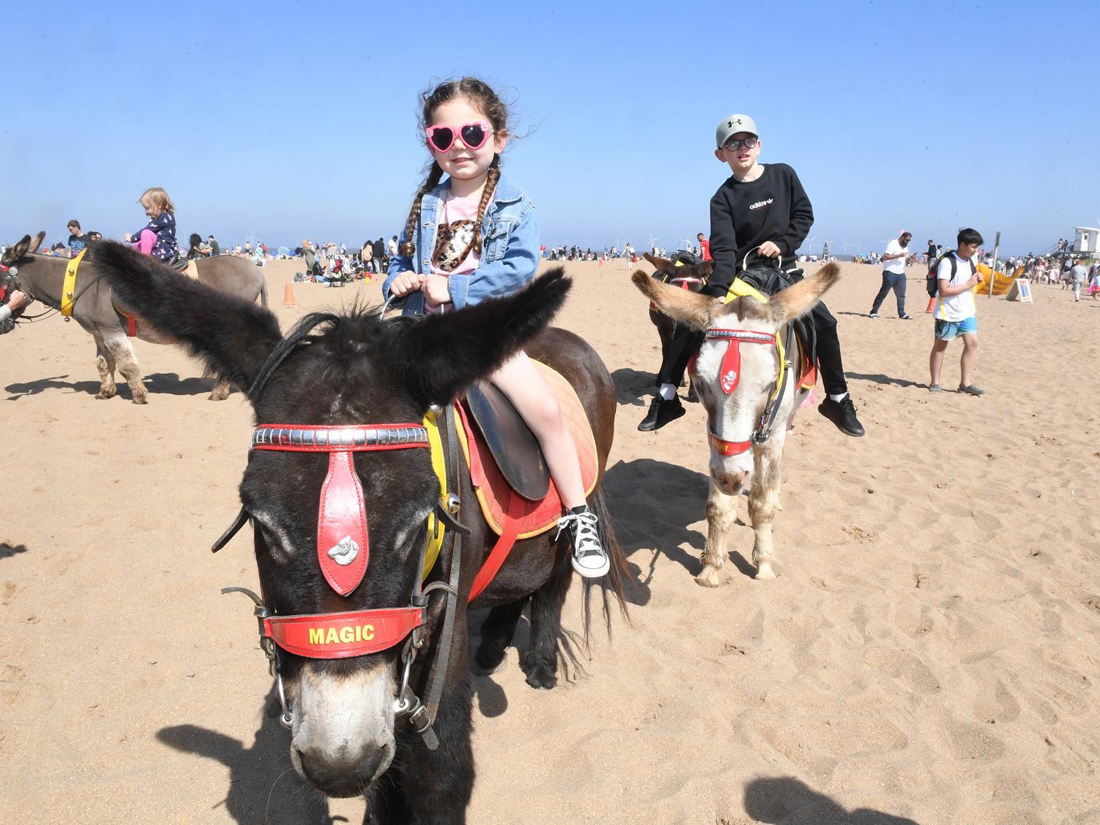 Fearne Harrison, 3, enjoying a ride on the donkeys on Skegness beach.