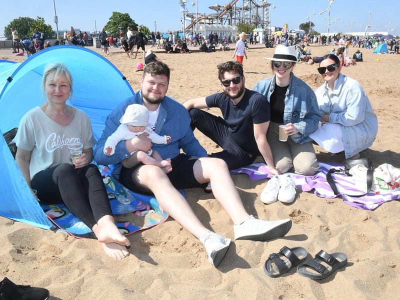 Chris and James Palmer with six-month-old Buddy (left), with Aron, Jane and Lucy Palmer of Leicester.