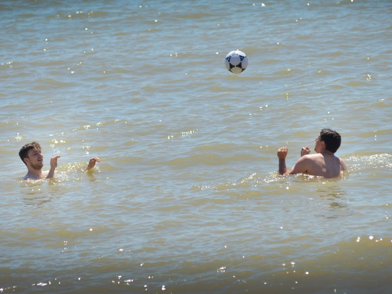 People enjoying the bank holiday sun on May 31.
Photo taken on St Leonards seafront. SUS-210531-141436001