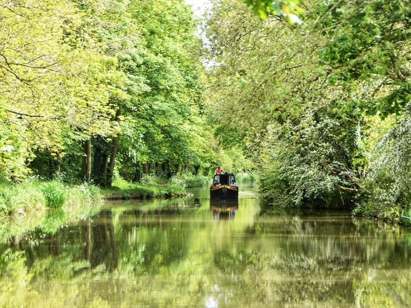 Watching the boats drift along the canal.