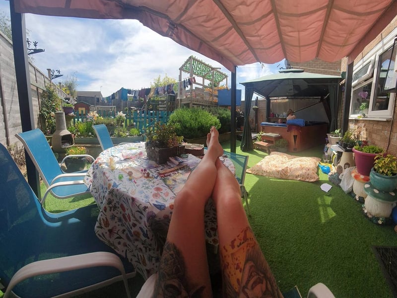 This is the life! "Chilling while the kids play in the hot tub."