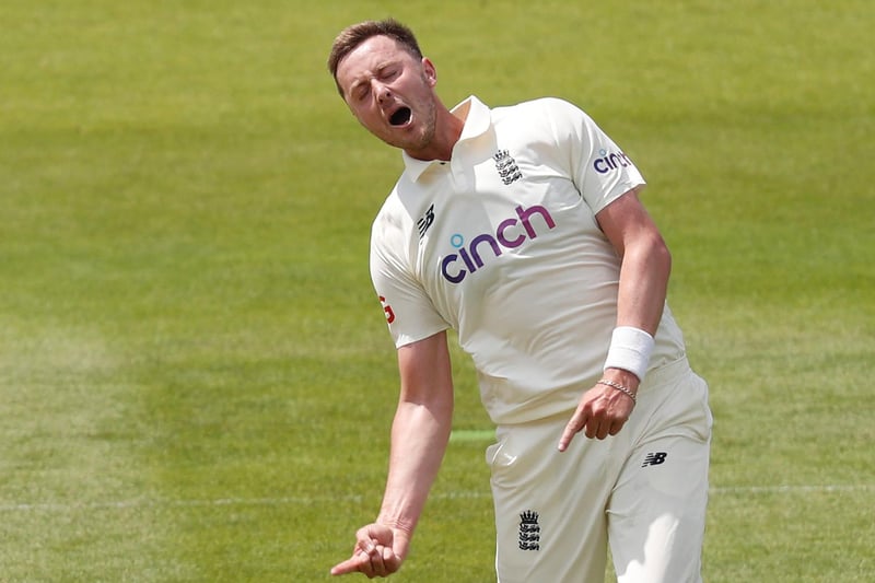 Images from Ollie Robinson's first day as a Test cricketer, on which he took two for 50 as England struggled against the New Zealand batsmen / Picture: Getty
