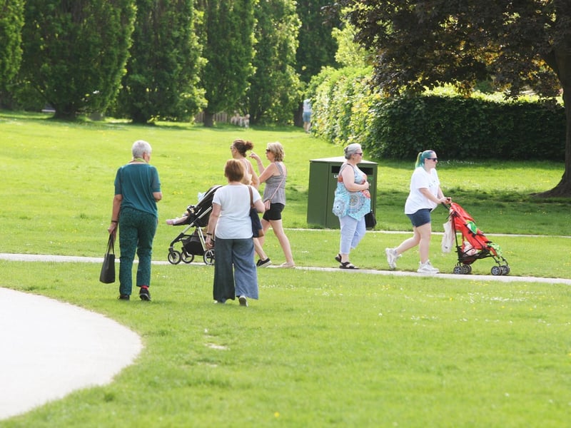 People enjoying a stroll in the park