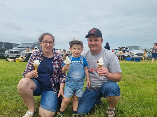The Kerso family from Skegness enjoying an icecream at Burgh le Marsh car boot sale.