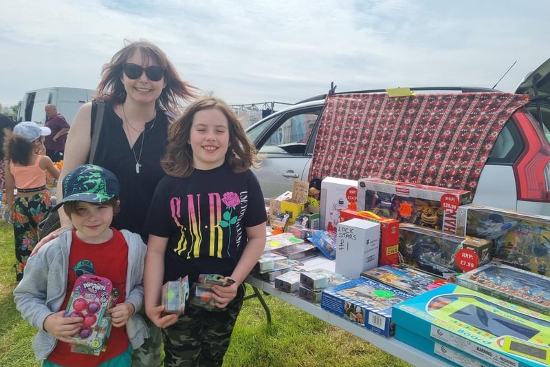 Bargains galore! Wendy Beresford, Ezra, 5, and Eve, 8, of Cheltenham, had found all sorts of things, including toys and a nest of tables for the caravan at Southview Holiday Park.