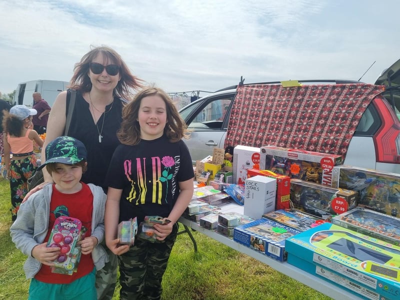 Bargains galore! Wendy Beresford, Ezra, 5, and Eve, 8, of Cheltenham, had found all sorts of things, including toys and a nest of tables for the caravan at Southview Holiday Park.