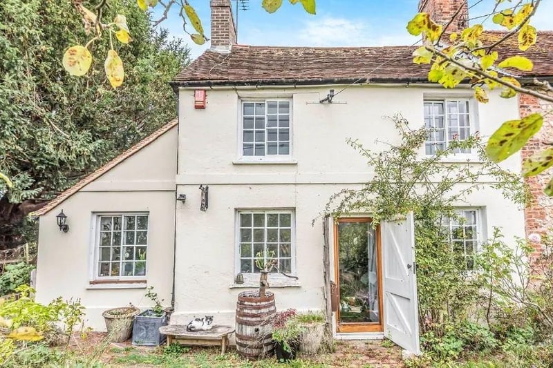 A Grade II listed character cottage at the foot of the South Downs. Price: £430,000.