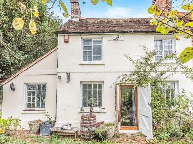 A Grade II listed character cottage at the foot of the South Downs. Price: £430,000.