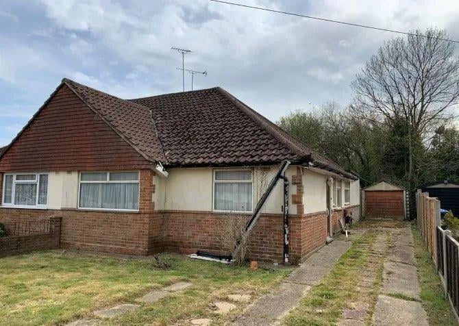 A semi-detached bungalow in need of modernisation. For sale by auction on June 10 with a guide price of £240,000.
