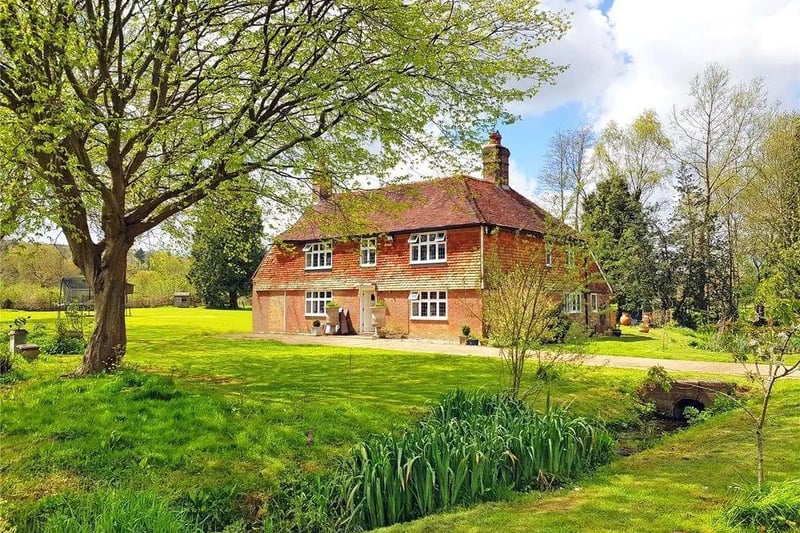 A charming and most attractive Grade II listed former farmhouse. Price: £850,000.