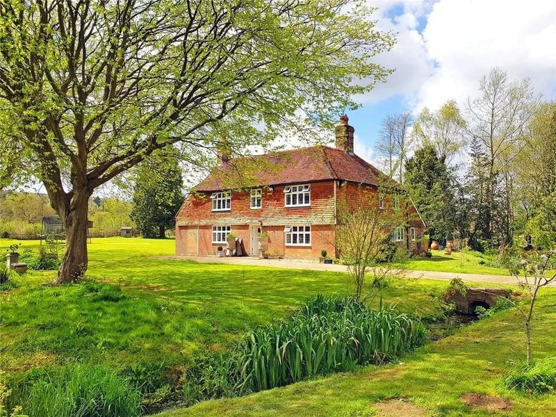 A charming and most attractive Grade II listed former farmhouse. Price: £850,000.