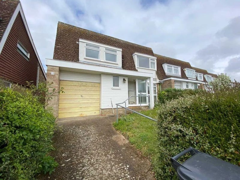 A three bedroom detached house. Price: £295,000.