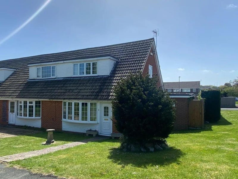 A bright and very spacious two/three bedroom end-of-terrace house. Price: £260,000.