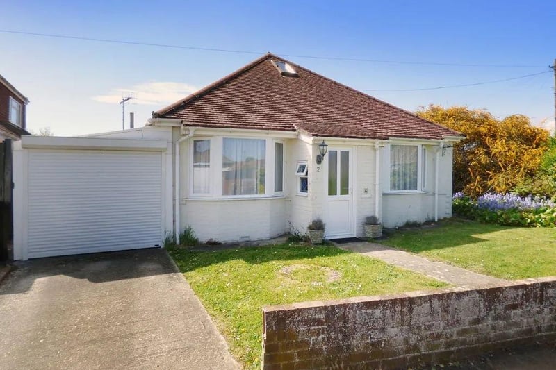 A spacious detached bungalow on a large corner plot. Price: £350,000.