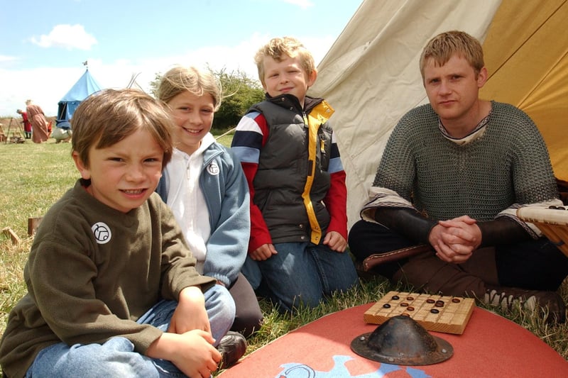 Time travel event at Flag Fen saw youngsters learning board game "Tafl" dating back from Late Roman/early Saxon period.