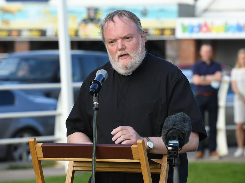 The vigil in for Bethany and Darren 'DJ' Henson in Chapel St Leonards, led by Rev Richard Holden.