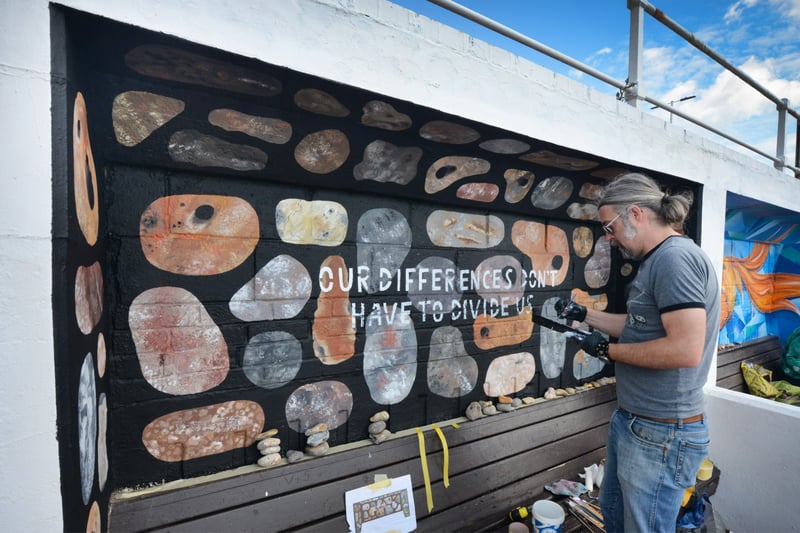 Community art project on St Leonards seafront next to Goat Ledge.

Scott Garrett SUS-210506-124224001