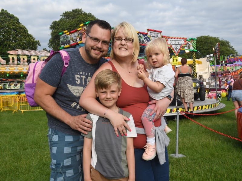 Fun Fair on Sleaford Rec. Kai and Tara Glenn of Sleaford with daughter Evelyn Glenn and nephew Leon Oliver. EMN-211006-082215001