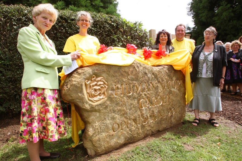 HOR 180611 Opening of Human Nature Garden in Horhsam Park. Unveiling of the stone L to r Sue Brandish, Stephanie Carter project co-ordinator for Horsham in Bloom, Claire Vickers Chairman HDC, Evan Giles, park services manager and Jean Griffin. photo by derek martin ENGSNL00120110620101211