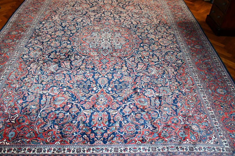 A Persian Floral Carpet, 11 ft x 8ft 6 “. £800-1500