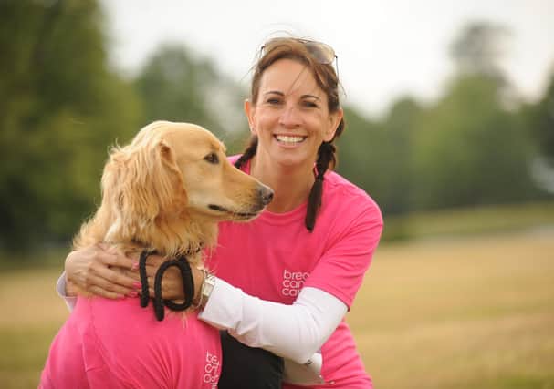 TV presenter Andrea McLean with Jackson at the beginning of the ten-mile walk in June 2011. Picture: Louise Adams C111008-5