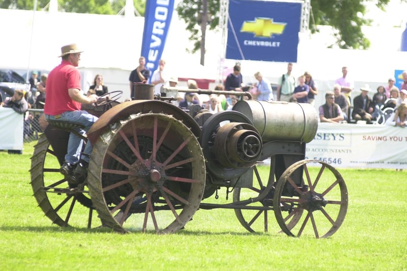 Audiences watch a very old tractor getting a move on at the 2008 show.