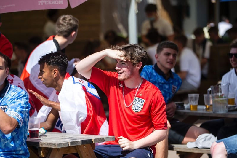England fans watched the game outside at Barratts. Photo: Kirsty Edmonds