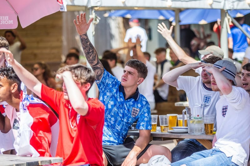 England fans watched the game outside at Barratts. Photo: Kirsty Edmonds