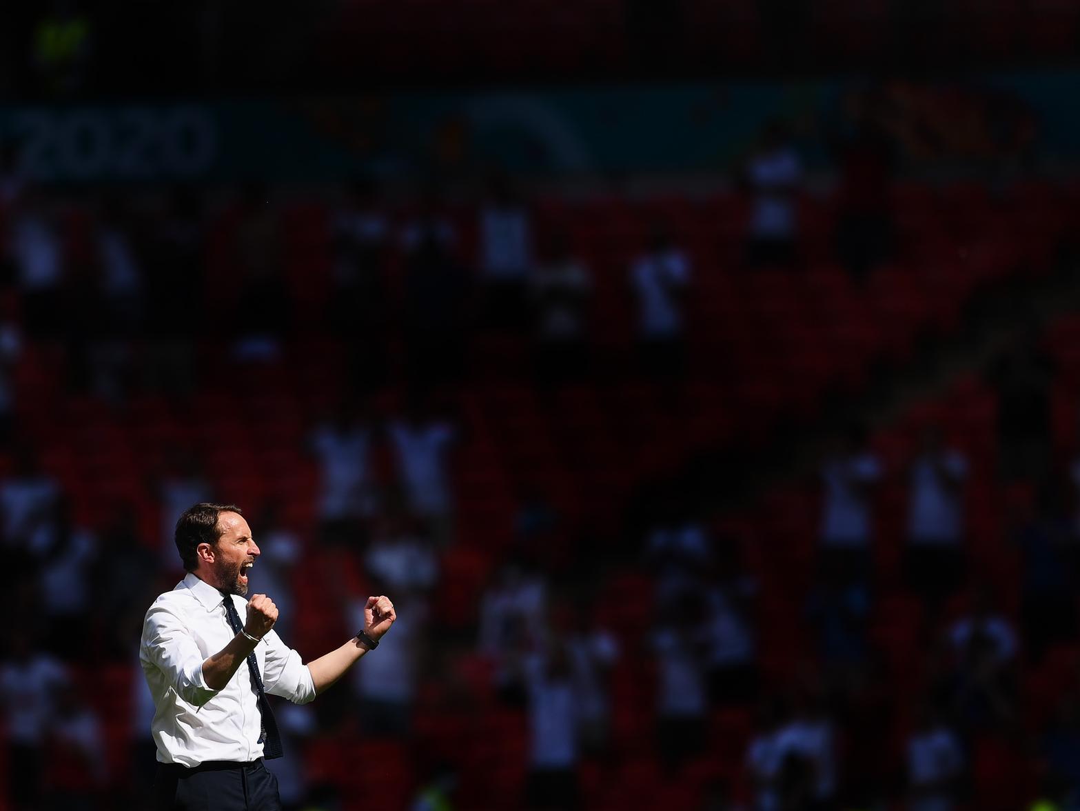 Gareth Southgate celebrates England's win against Croatia