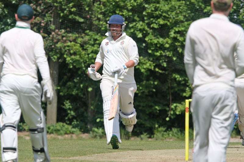 Malcolm Johnson takes a run for Eastbourne
