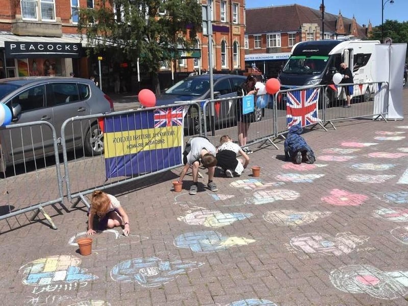 Children enjoyed colouring in the poppies over a large area of pavement.
