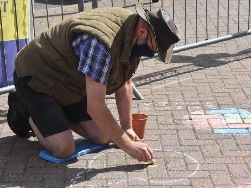 Adults also helped colour in poppies.