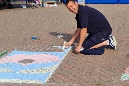 Ady Findley, a member of the Skegness branch of the Royal British Legion, was on site at 5.30am creating the centrepiece for the field of poppies, which is the RBL's new logo.