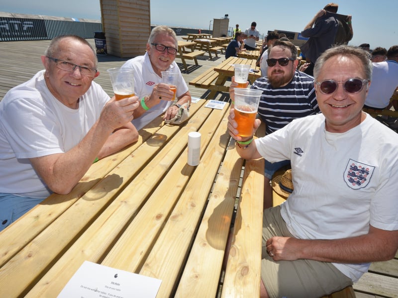 Football fans getting ready to watch England V Croatia at the Bier Garden on Hastings Pier. SUS-210614-070835001