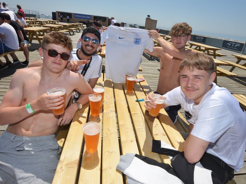 Football fans getting ready to watch England V Croatia at the Bier Garden on Hastings Pier. SUS-210614-070938001