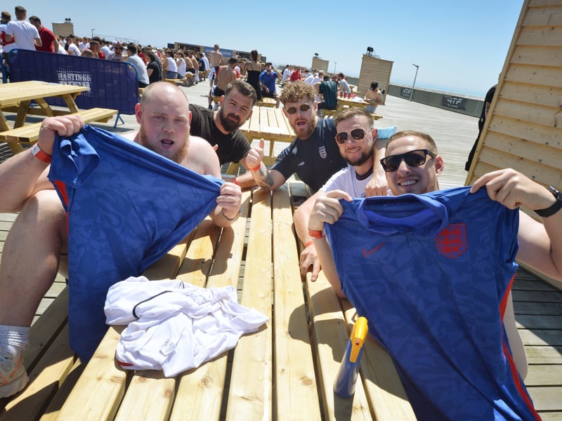 Football fans getting ready to watch England V Croatia at the Bier Garden on Hastings Pier. SUS-210614-070240001