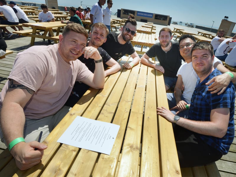 Football fans getting ready to watch England V Croatia at the Bier Garden on Hastings Pier. SUS-210614-071027001