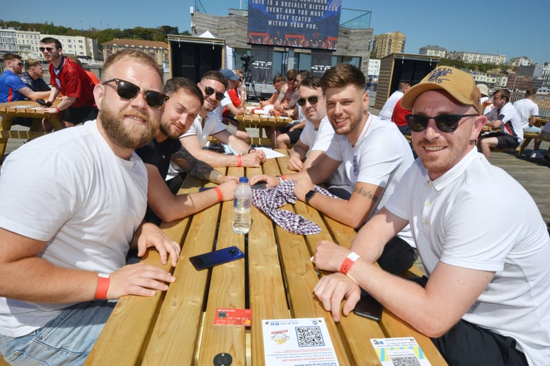 Football fans getting ready to watch England V Croatia at the Bier Garden on Hastings Pier. SUS-210614-070101001