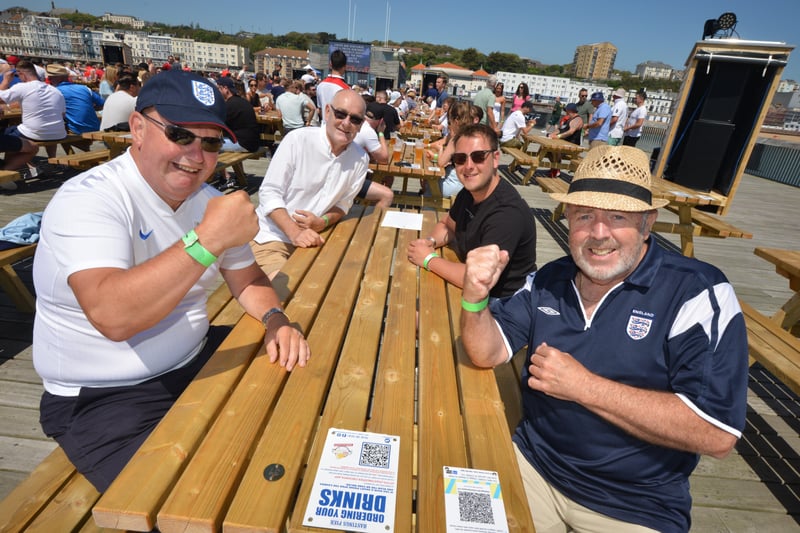 Football fans getting ready to watch England V Croatia at the Bier Garden on Hastings Pier. SUS-210614-070341001
