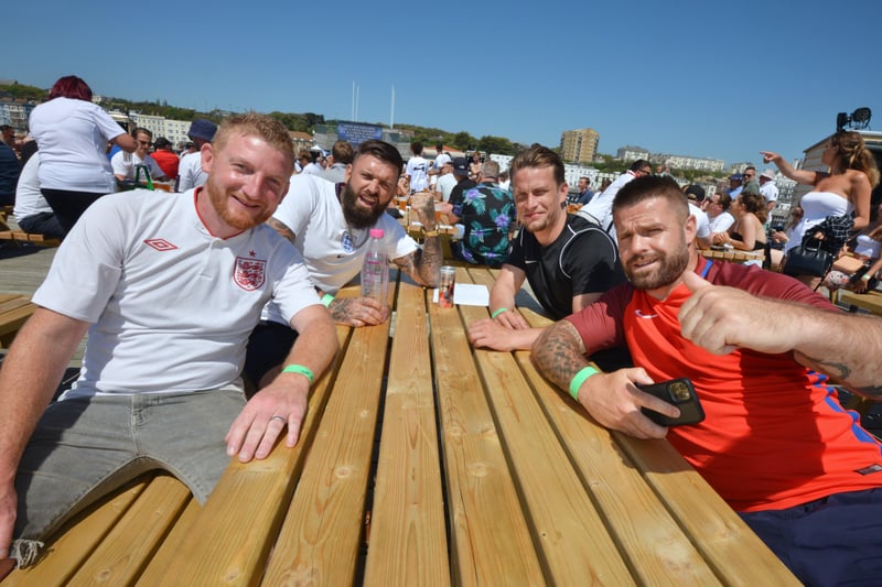 Football fans getting ready to watch England V Croatia at the Bier Garden on Hastings Pier. SUS-210614-070354001