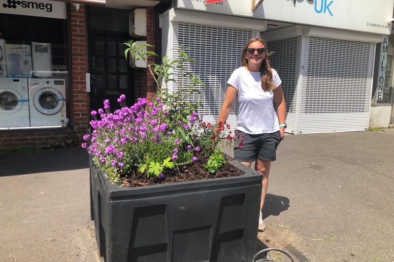 Kate Bradbury, who has appeared on Springwatch and Gardeners World, next to the planter she helped to revive at the weekend