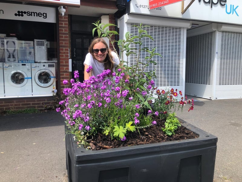Kate Bradbury, local resident, author and wildlife gardener who has appeared on Springwatch and Gardeners World, has adopted the planter outside Hills in Station Road