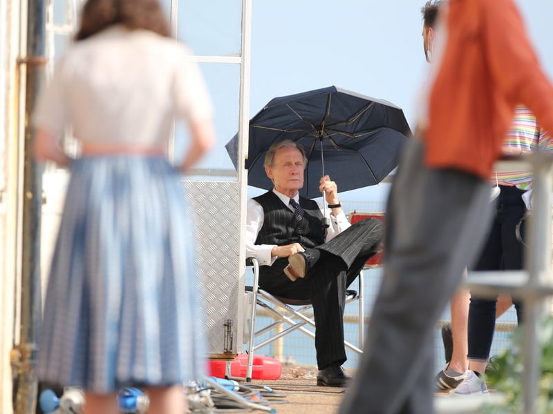 Bill Nighy was filming at Worthing Lido this week. Other actors were seen wearing what looked to be 1950s clothing.