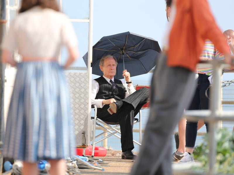 Bill Nighy was filming at Worthing Lido this week. Other actors were seen wearing what looked to be 1950s clothing.